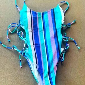 One piece tie on side swimsuit